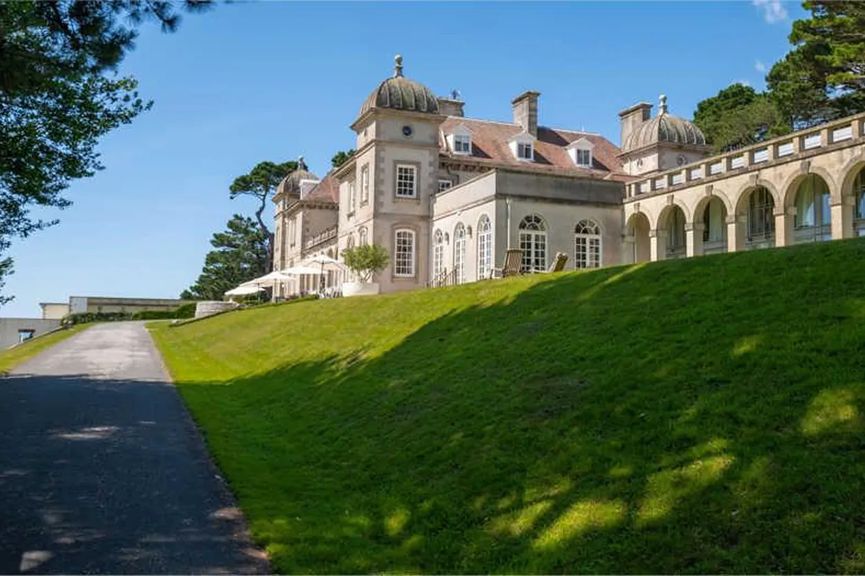 Front view of Fowey Hall hotel near bluewater